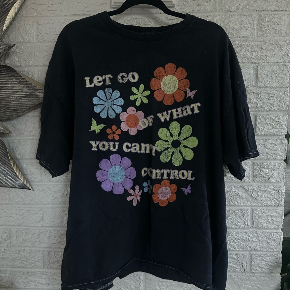 Black Graphic T-Shirt with Colorful Floral Design
